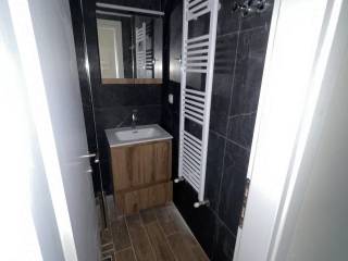 Forumland Real Estate, Μπάνιο