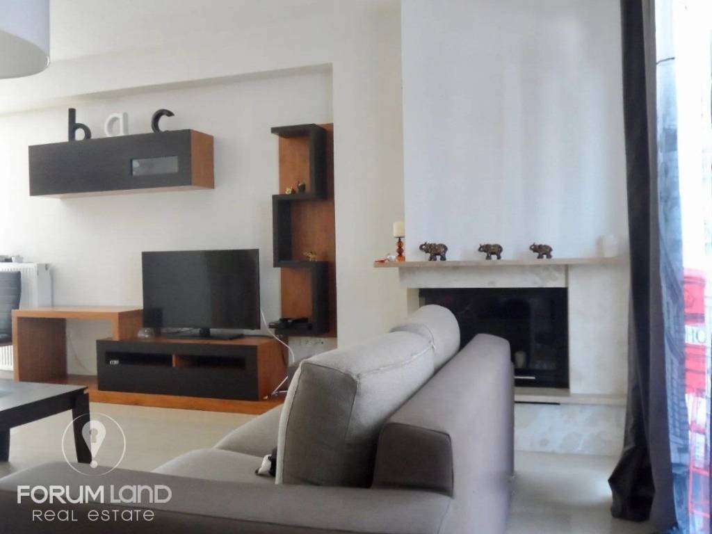 Forumland Real Estate, Σαλόνι με τζάκι