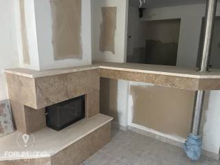 Forumland Real Estate, Σαλόνι με τζάκι