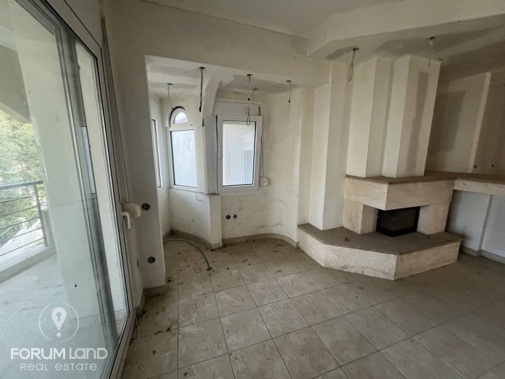 Forumland Real Estate, Σαλόνι με τζάκι