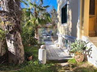 OUTSIDE VIEW OF THE BUILDING - GARDEN
