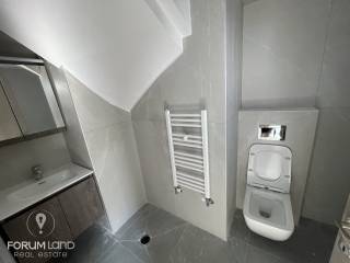 Forumland Real Estate, Μπάνιο