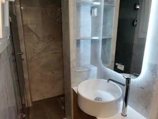 Forumland Real Estate, Μπάνιο