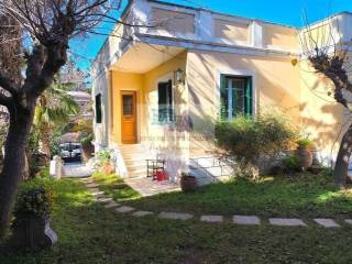 OUTSIDE VIEW OF THE BUILDING - GARDEN