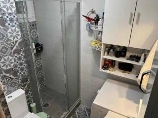 Forumland Real Estate, Μπάνιο