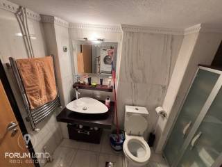 Forumland Real Estate, Μπάνιο