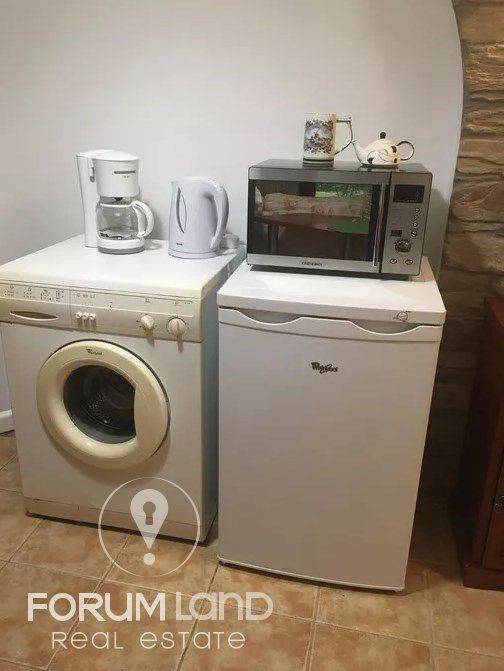 Forumland Real Estate, Πλυντήριο και ψυγείο