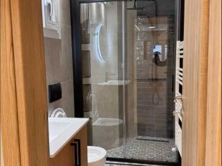 Forumland Real Estate, Μπάνιο