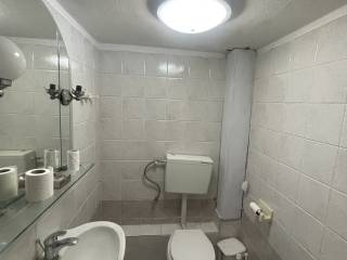 Forumland Real Estate, Μπάνιο