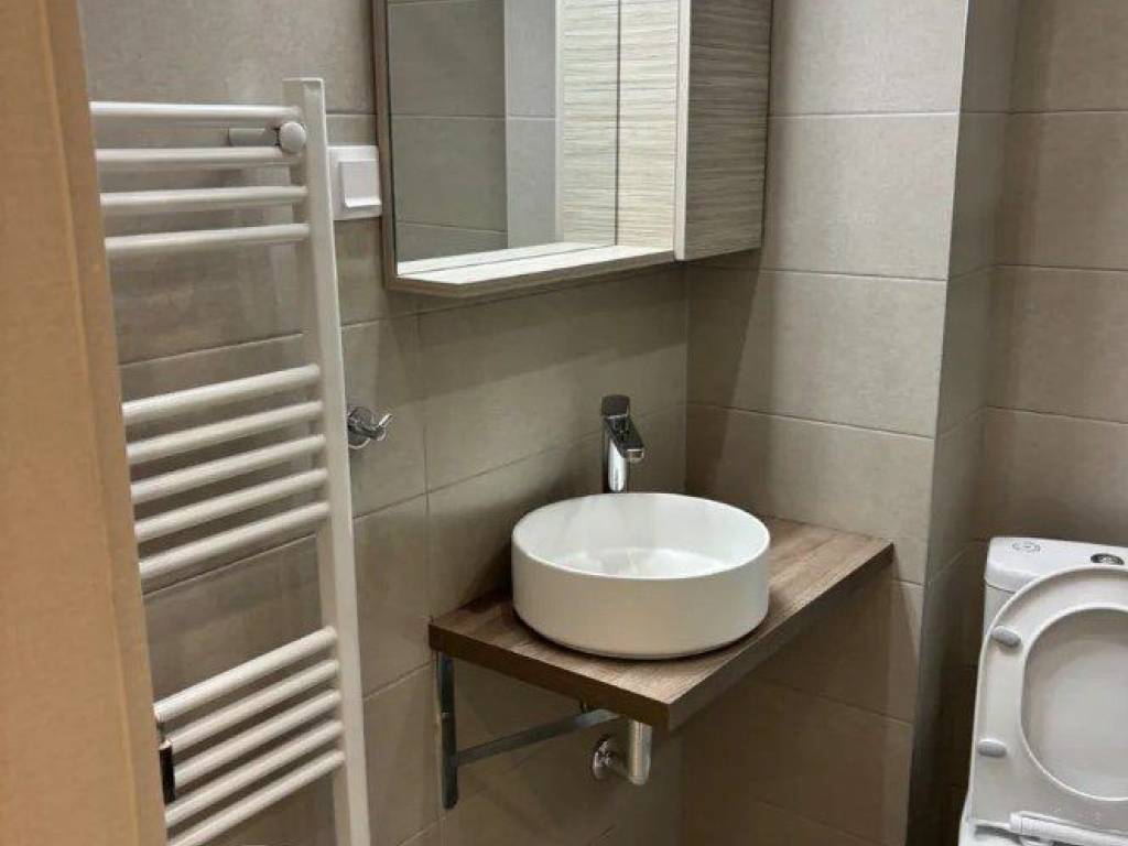 Forumland Real Estate, Μπάνιο