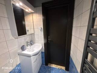 Forumland Real Estate, Μπάνιο