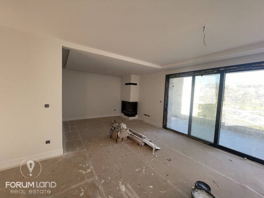 Forumland Real Estate, Σαλόνι με τζάκι