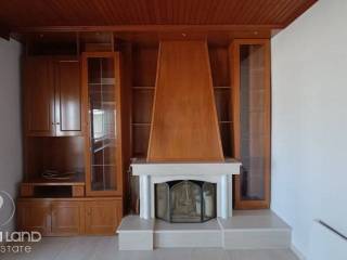 Forumland Real Estate, Σαλόνι με τζάκι