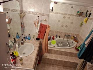 Forumland Real Estate, Μπάνιο