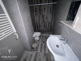 Forumland Real Estate, Μπάνιο
