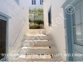 Central door up to entrance courtyard at back of top floor