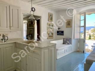 Kitchen to dining area and out to sea facing terrace