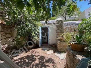 Garden shower/utility room at back of ruins to west side