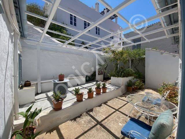 Top floor across entrance courtyard to higher garden