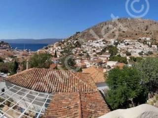 View of main house, and Hydra harbour from chapel terrace