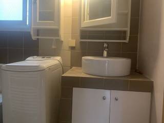 Forumland Real Estate, Μπάνιο