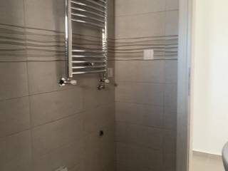 Forumland Real Estate, Μπάνιο