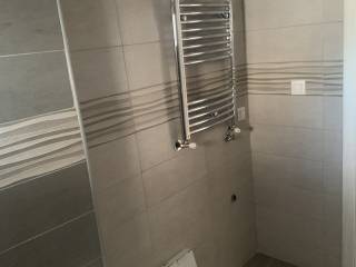 Forumland Real Estate, Μπάνιο