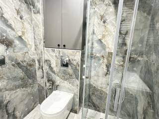 Forumland Real Estate, Μπάνιο