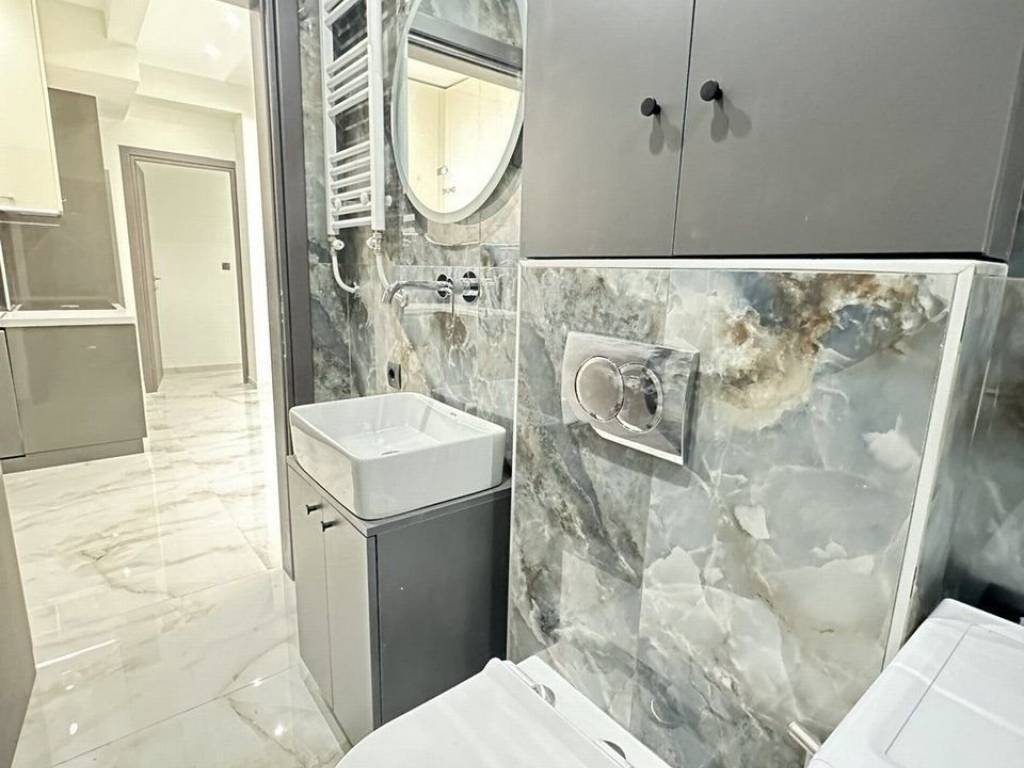 Forumland Real Estate, Μπάνιο