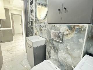 Forumland Real Estate, Μπάνιο