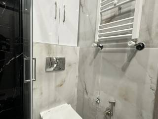 Forumland Real Estate, Μπάνιο