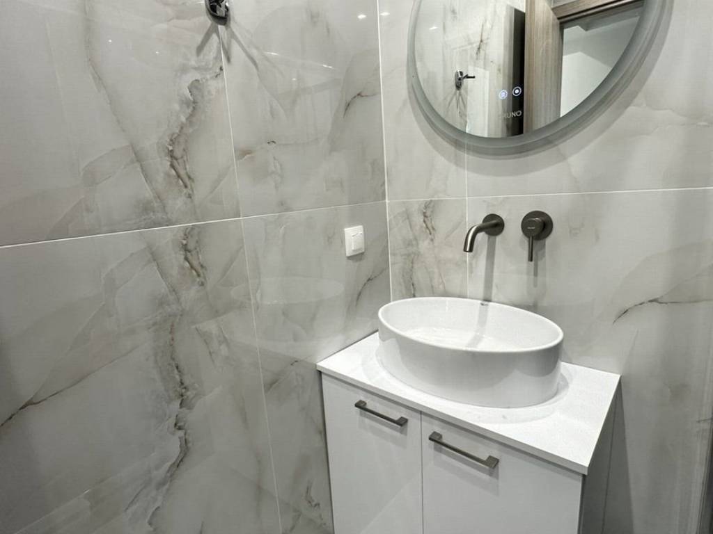 Forumland Real Estate, Μπάνιο