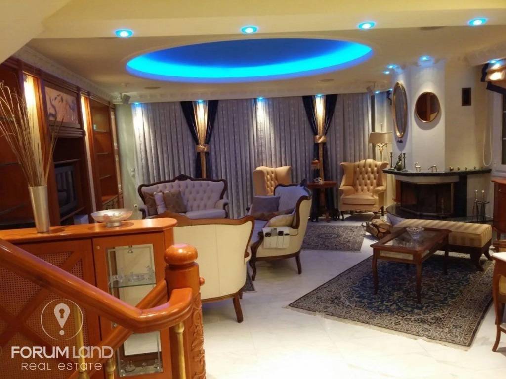 Forumland Real Estate, Σαλόνι με τζάκι