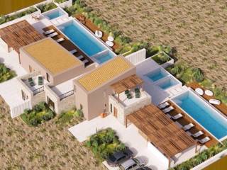 Ypo kataskeye polyteles bila sten Pege Rethymnoy.