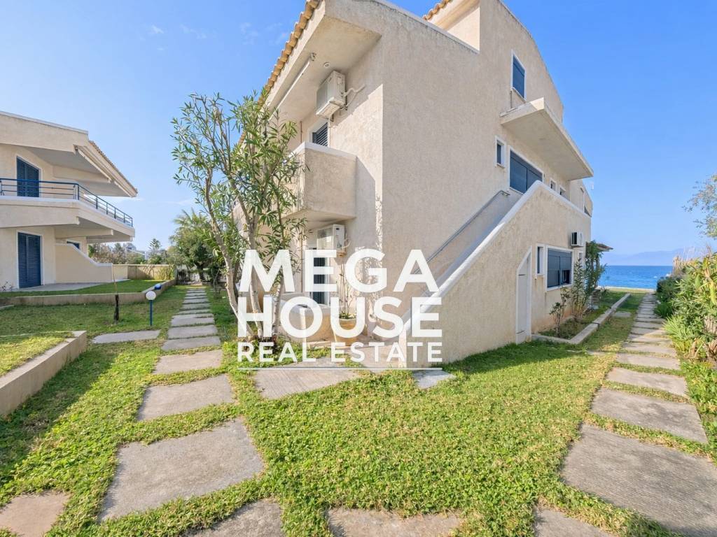 behind corner of the apartment