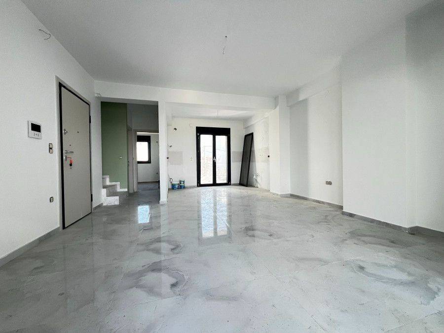 Καθιστικό και κουζίνα.