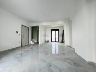 Καθιστικό και κουζίνα.