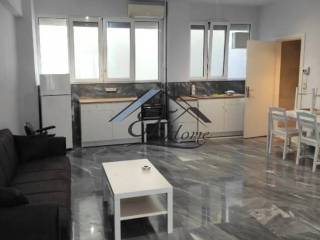 Ενιαίος χώρος σαλόνι-κουζίνα