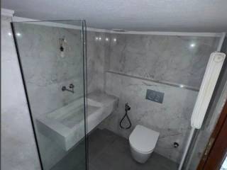 Forumland Real Estate, Μπάνιο