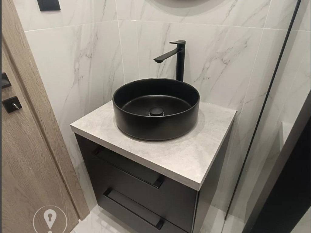 Forumland Real Estate, Μπάνιο