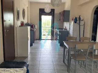 Eniaios choros koyzinas-kathistikoy - trapezarias