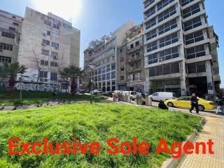 Top of building in corner opposite garden