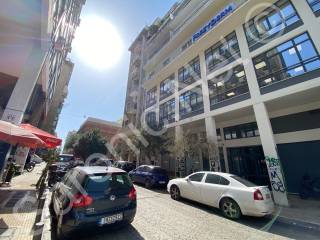 Apt building looking to back of National Theatre of Greece