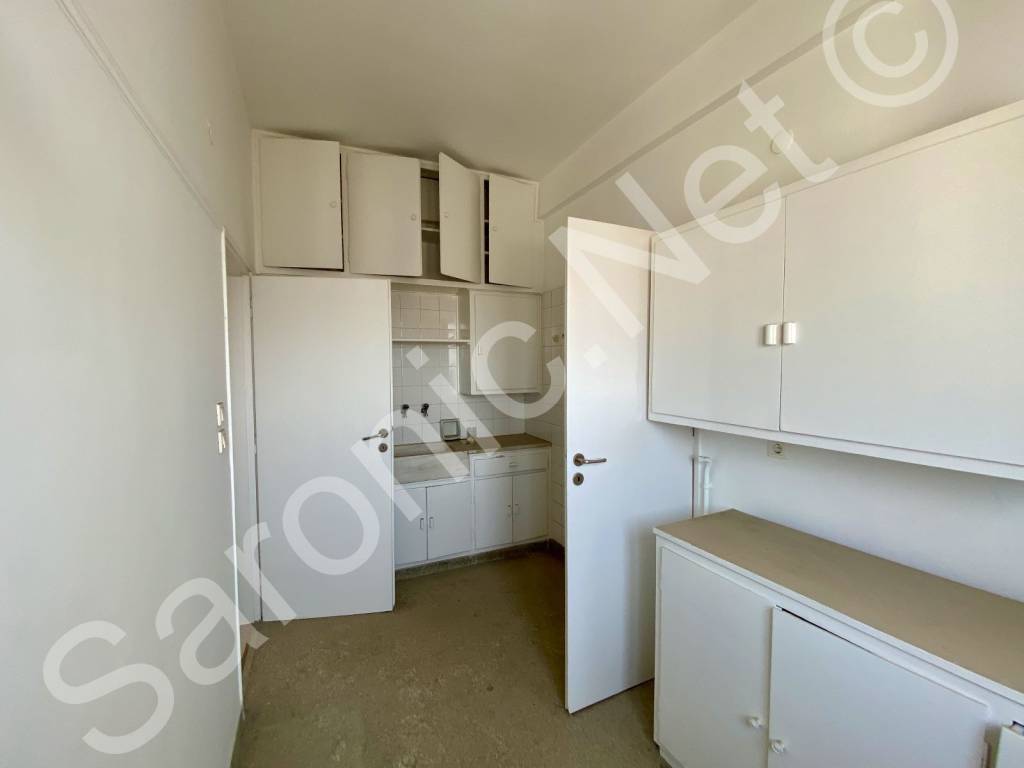 Kitchen, door left to utility, door right to inner hall