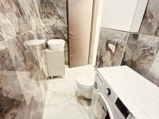 Forumland Real Estate, Μπάνιο