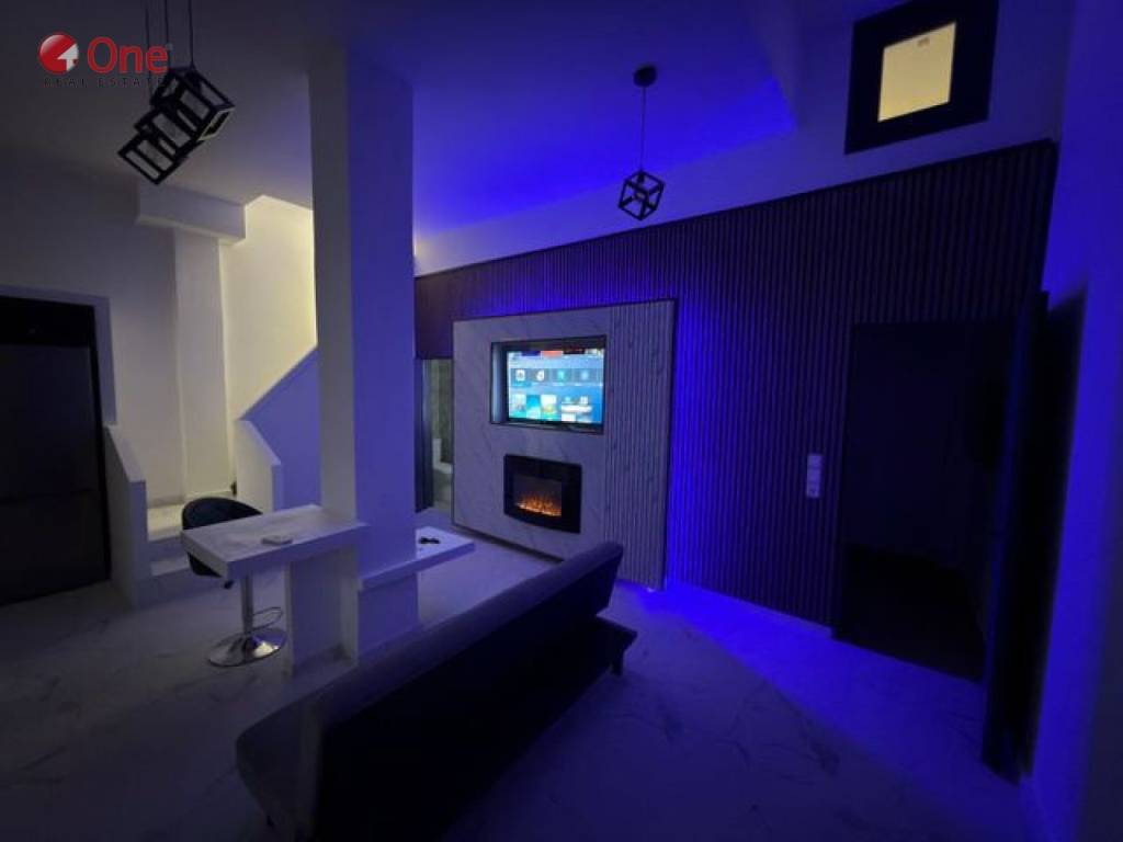 Σαλοκουζίνα με TV  και ηλ. τζάκι φ.1