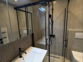 Forumland Real Estate, Μπάνιο