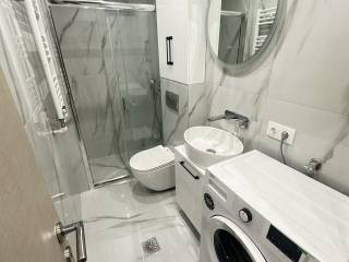 Forumland Real Estate, Μπάνιο