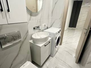 Forumland Real Estate, Μπάνιο