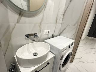 Forumland Real Estate, Μπάνιο